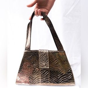 Handbag, metallic leather, intricate pattern & appliqué; 2 inside zip pockets
